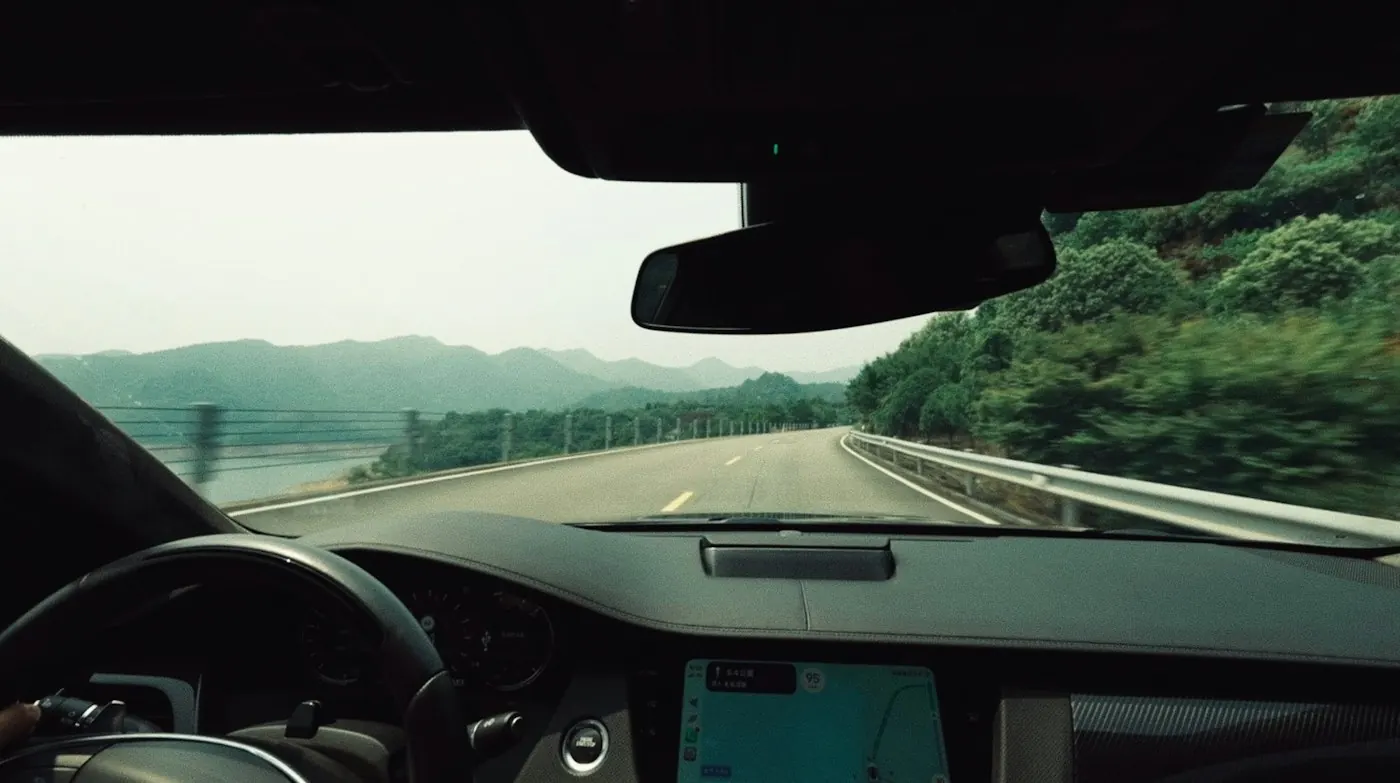 View from the driver’s seat on a mountain road